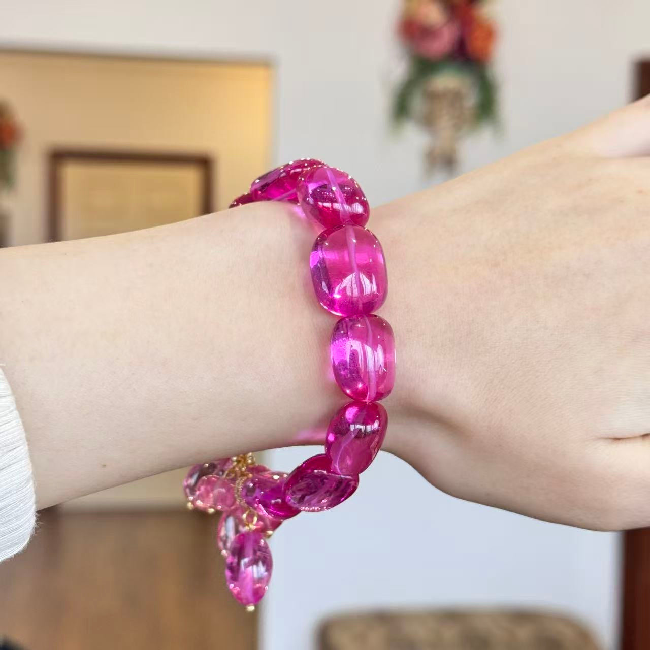 Padparadscha pink bracelet close-up worn on wrist