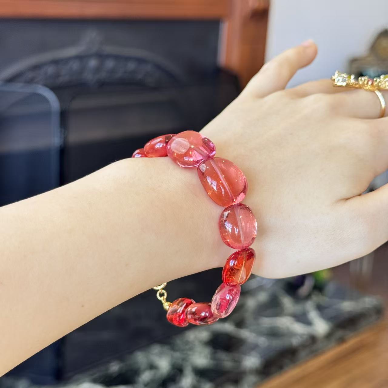 Padparadscha Gradient Bracelet worn on wrist